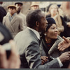 Attendees greet each other at James Baldwin's funeral