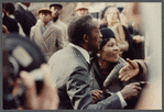 Attendees greet each other at James Baldwin's funeral
