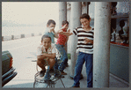 Four Turkish children laughing