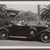 Marion Morgan with unidentified man in a car
