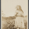 Postcard of Fania Marinoff as Wendla in an open field of flowers, related to the stage production The Awakening of Spring