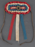 [Lincoln button on ribbon]
