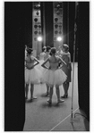 New York City Ballet dancers seen from wings getting notes before Balanchine's "Swan Lake"