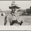 Rehabilitation client rolling a cigarette. Gage County, Nebraska.