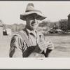 Rehabilitation client rolling a cigarette. Gage County, Nebraska.