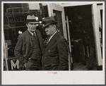 Men in front of pool hall, Omaha, Nebraska.