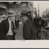 Men on lower Douglas Street, Omaha, Nebraska.