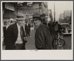 Men on lower Douglas Street, Omaha, Nebraska.