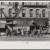 Lower Douglas Street, where unemployed hang out, Omaha, Nebraska.