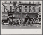 Lower Douglas Street, where unemployed hang out, Omaha, Nebraska.