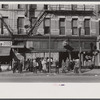 Lower Douglas Street, where unemployed hang out, Omaha, Nebraska.