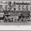 Lower Douglas Street, where unemployed hang out, Omaha, Nebraska.