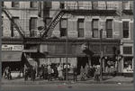 Lower Douglas Street, where unemployed hang out, Omaha, Nebraska.