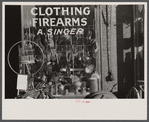 Secondhand goods. Note surgical instruments in window, Omaha, Nebraska.