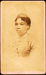 Portrait of unidentified young woman wearing ribbon on head.