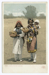 Pueblo Indians selling Pottery