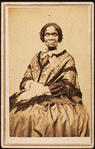 Three-quarter length portrait of unidentified woman dressed with long-fringed shawl. Born Feb. 22, 1791-72, on verso.