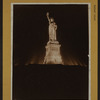 Islands - Bedloe's Island - [View of the Statue of Liberty illuminated at night.]