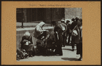 Occupations - Peddlers - Clothing - Sidewalk merchant.