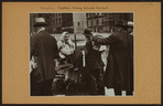 Occupations - Peddlers - Clothing - Sidewalk merchant.