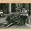 Occupations - Peddlers - Food - [Roast potato vendor and his movable oven on an east side street.]