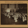 Recreation and hobbies - Children's group dancing [at night in the court of one of New York public schools.]