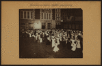 Recreation and hobbies - Children's group dancing [at night in the court of one of New York public schools.]