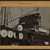 Workmen and laborers - [Unloading newsprint from Sweden at an East River pier.]