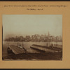 East River - Shore and skyline of lower Manhattan - South Ferry - Williamsburg Bridge - [Singer Manufacturing Company.]