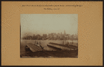 East River - Shore and skyline of lower Manhattan - South Ferry - Williamsburg Bridge - [Singer Manufacturing Company.]