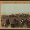 East River - Shore and skyline of lower Manhattan - South Ferry - Williamsburg Bridge - Brooklyn Bridge.
