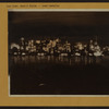 East River - Shore and skyline of lower Manhattan - [The magic city - New York at night.]