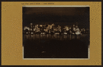 East River - Shore and skyline of lower Manhattan - [The magic city - New York at night.]