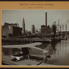 East River - Shore and skyline of Manhattan from East 31st Street.