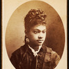 Oval quarter-length portrait of unidentified young woman, her bodice center trimmed with lace.