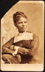 Half--length portrait of unidentified woman wearing wide lace collar.