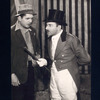 Warner Baxter and Fritz Feld in a scene from the motion picture I'll Give a Million