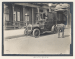 Taxi driver inspecting his vehicle