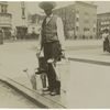 Man with watering cans.