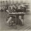 Newspaper woman.