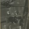 Two workers inspecting steel