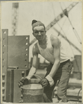 Worker holding a bucket