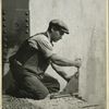 Worker bolting a steel support