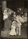 Italian family looking for lost baggage, Ellis Island