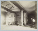 Interior with columns and decorative ceiling.