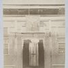 Carved wooden screen with banner decorated with a cross