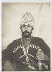 Male immigrant in ethnic dress at Ellis Island, New York