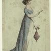 Woman holding a purse in one hand
