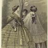 Woman in striped yellow dress and woman in purple and white dress with cape, United States
