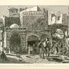 The Street of the Damascus Gate with a characteristic group of Bedouins outside a café on the left, a party of Turkish soldiers breakfasting, and on the right a group of dealers in fruit and vegetables